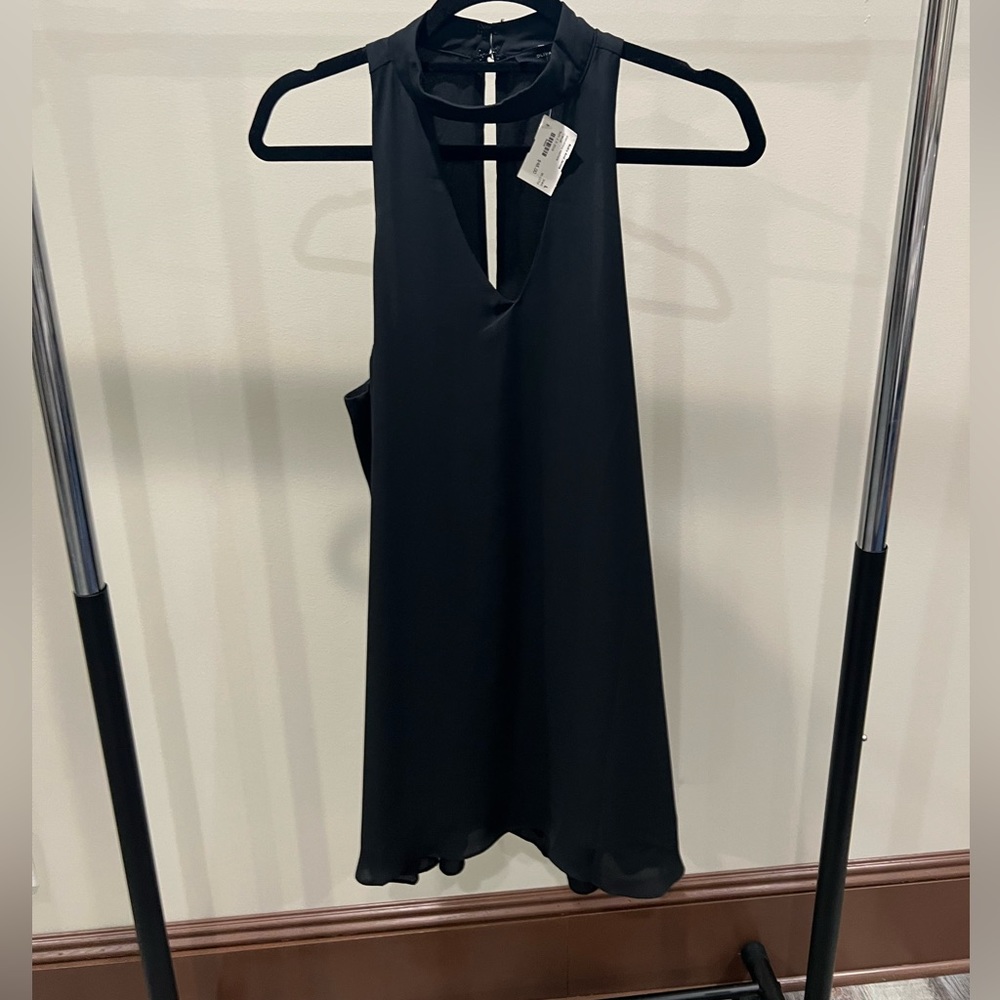Black sleeveless keyhole dress